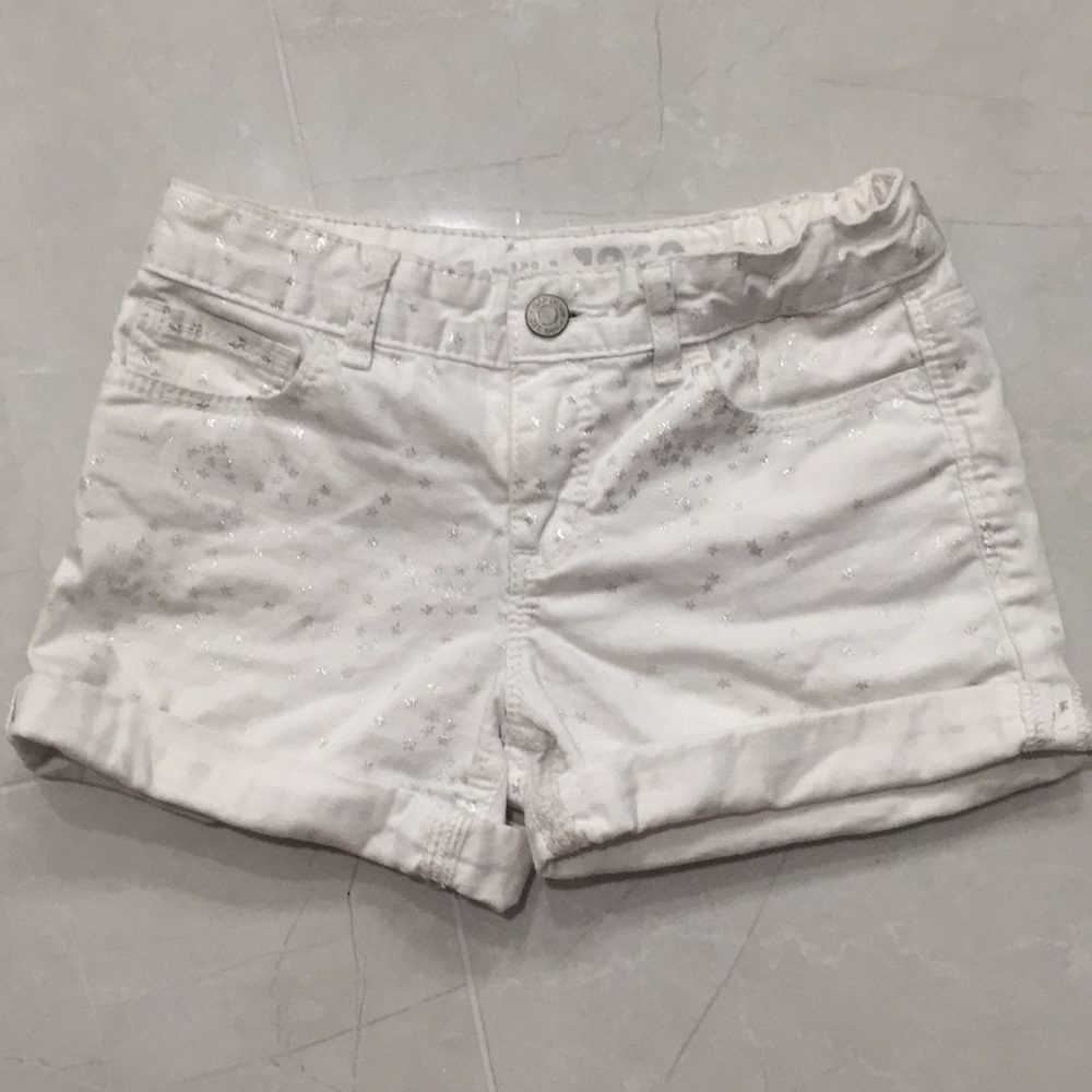Gap girls white jean shorts with silver stars.